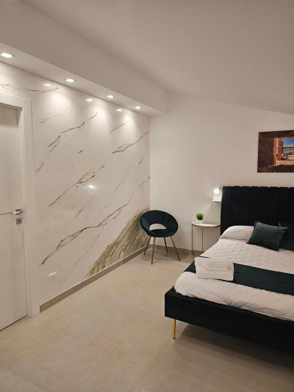 Postel nebo postele na pokoji v ubytování Aura B&B