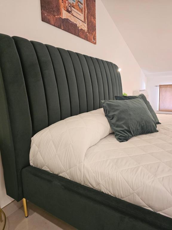 Postel nebo postele na pokoji v ubytování Aura B&B