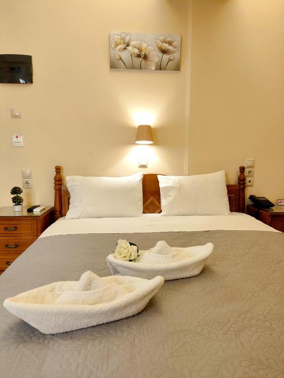 Postel nebo postele na pokoji v ubytování Hotel Anagennisis
