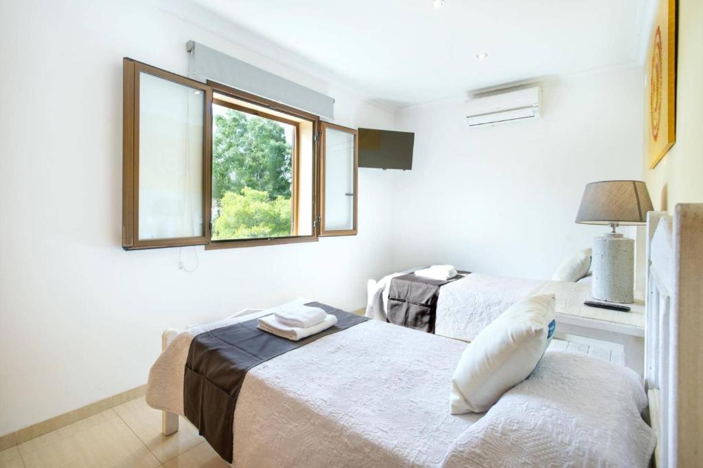 Postel nebo postele na pokoji v ubytování Villa Green Lake by Villa Plus