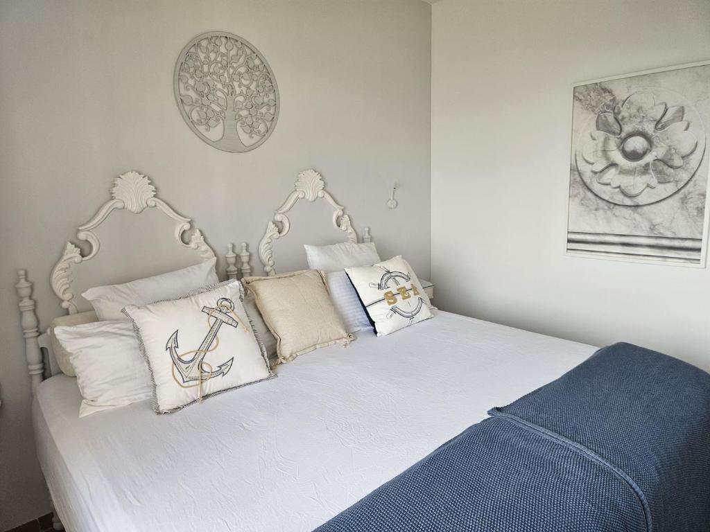 Postel nebo postele na pokoji v ubytování La Roqueta Hotel