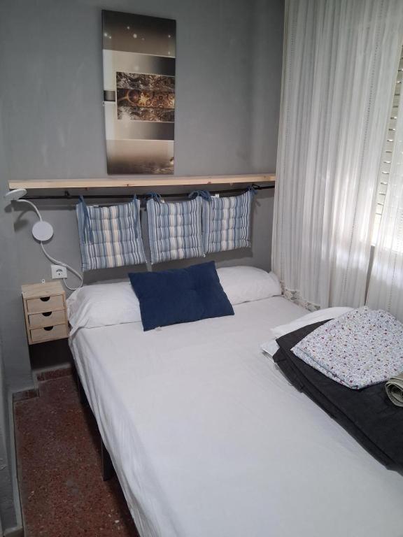 Postel nebo postele na pokoji v ubytování La Nueva