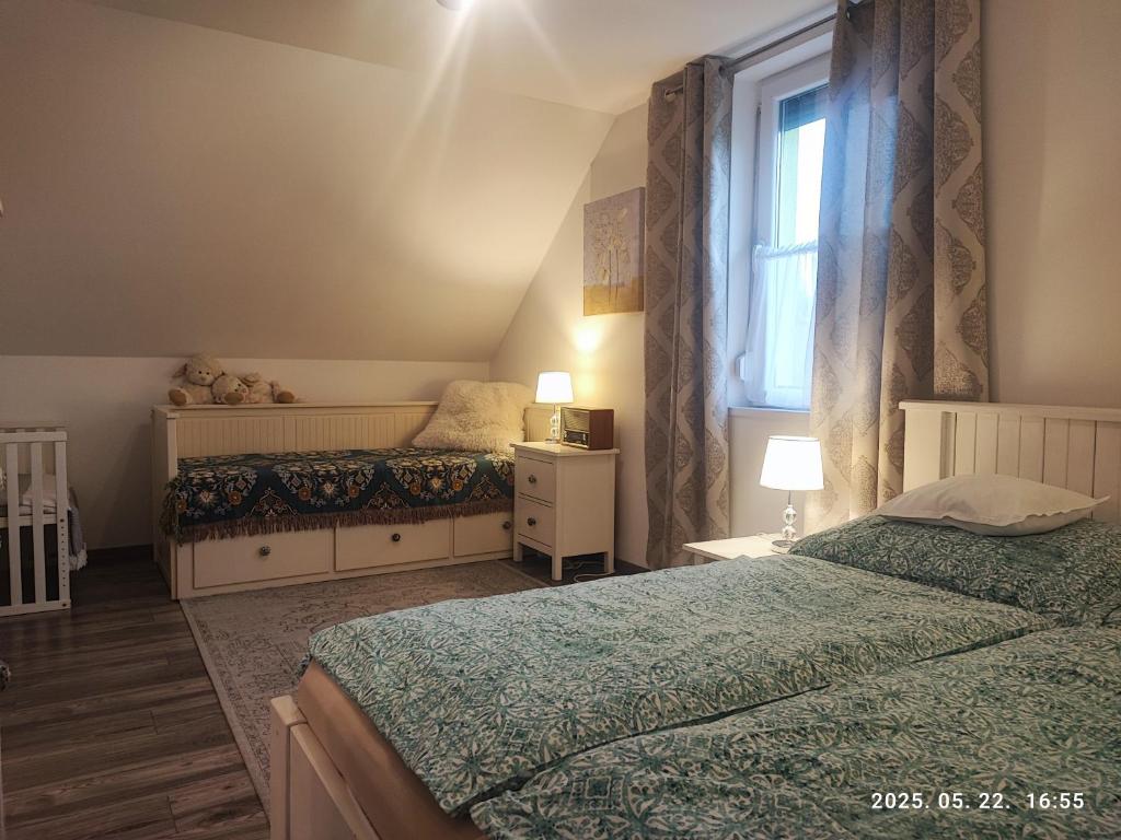 Posteľ alebo postele v izbe v ubytovaní Éva Háza Nyugalom/Pihenés/Relax