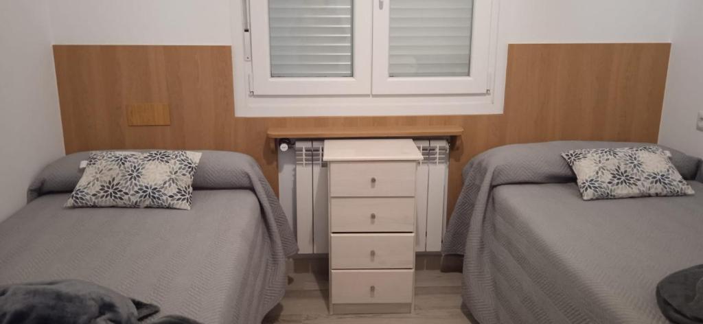 Postel nebo postele na pokoji v ubytování A casa do avó