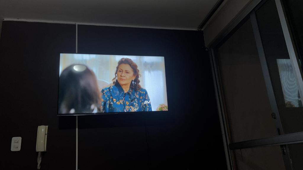 TV a/nebo společenská místnost v ubytování Suite en Tonsupa