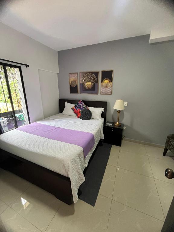 Postel nebo postele na pokoji v ubytování International Hotel Medellín