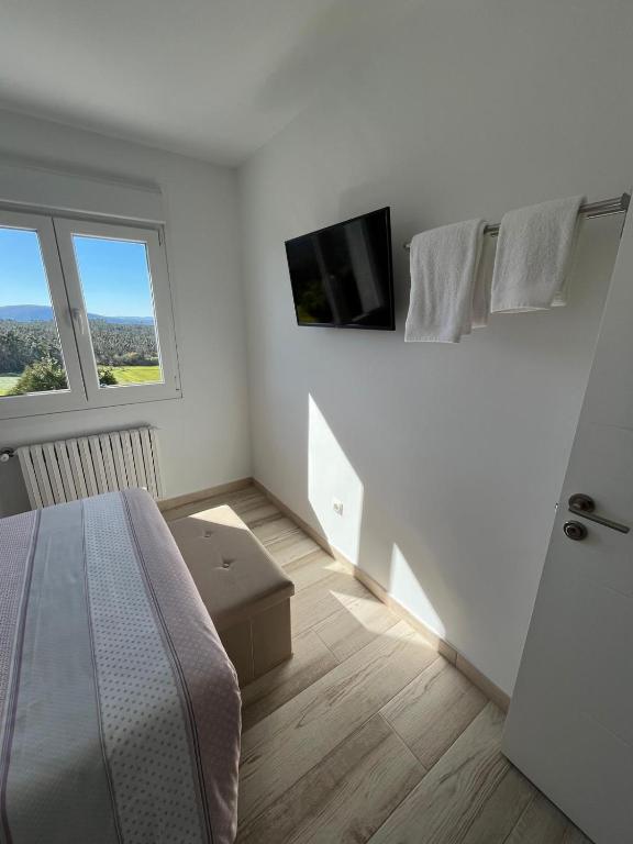 TV a/nebo společenská místnost v ubytování A casa do avó