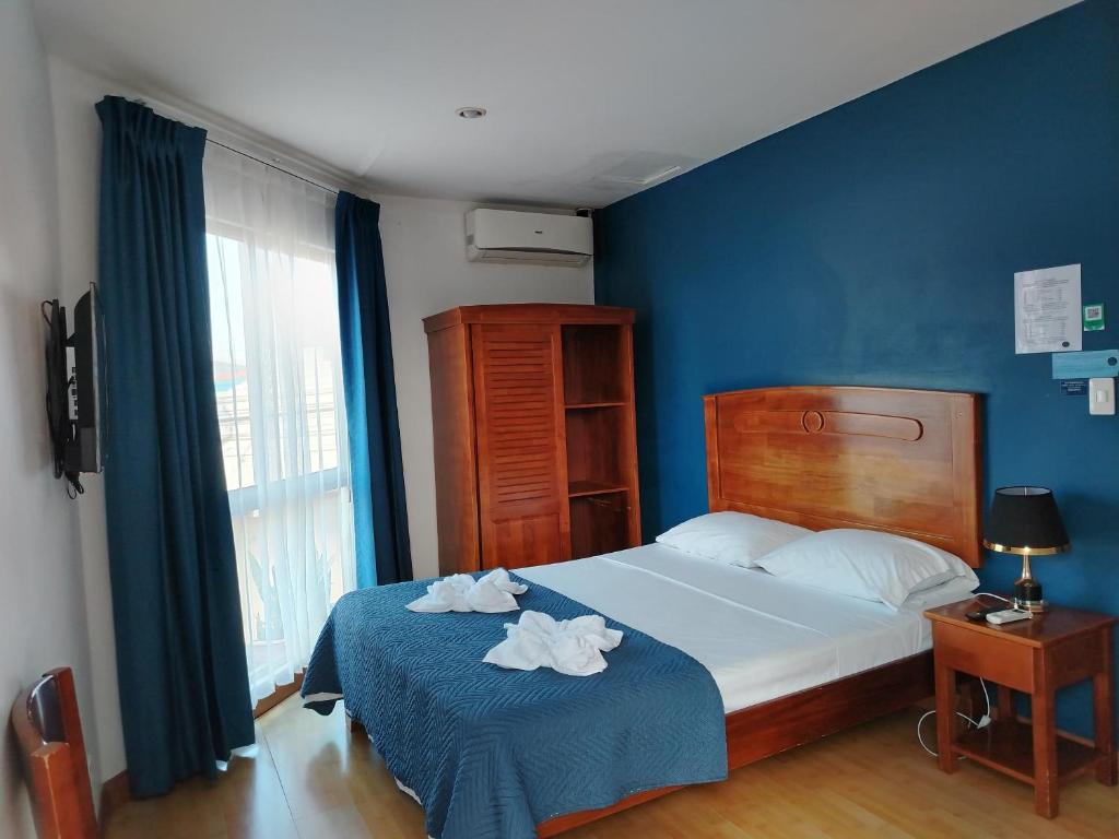 Postel nebo postele na pokoji v ubytování Park View Hotel & Restaurant