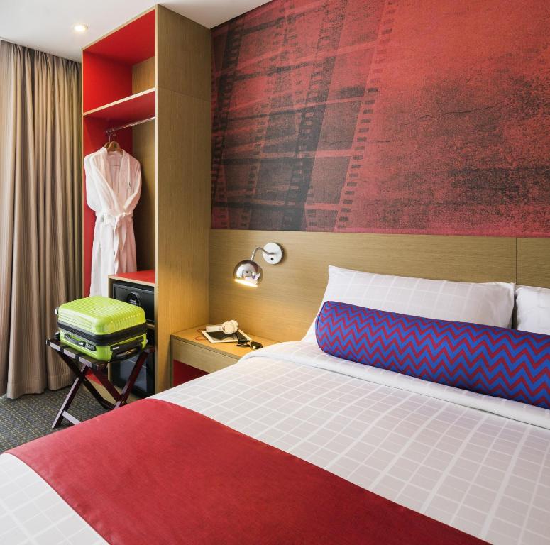 Postel nebo postele na pokoji v ubytování ibis Styles Ambassador Seoul Myeong-dong