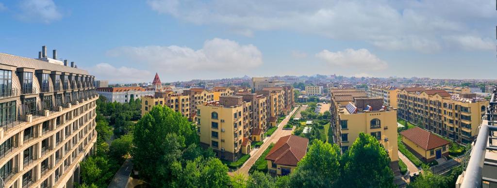 Nespecifikovaný výhled na destinaci Čchin-chuang-tao nebo výhled na město při pohledu z hotelu