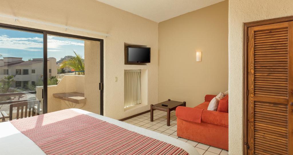 Телевизор и/или развлекательный центр в Solmar Resort