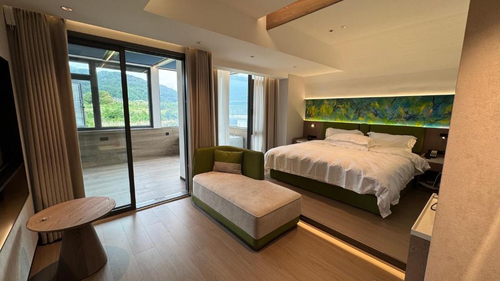 Ένα ή περισσότερα κρεβάτια σε δωμάτιο στο 佑汐酒店