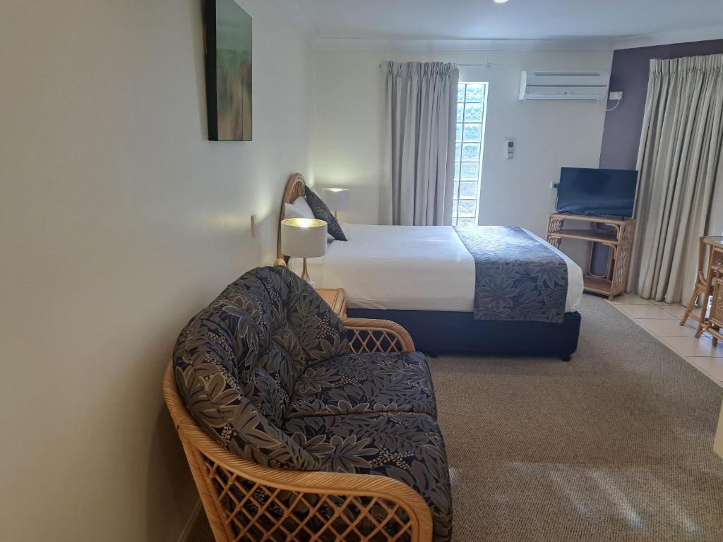 Postel nebo postele na pokoji v ubytování Sawtell Motor Inn