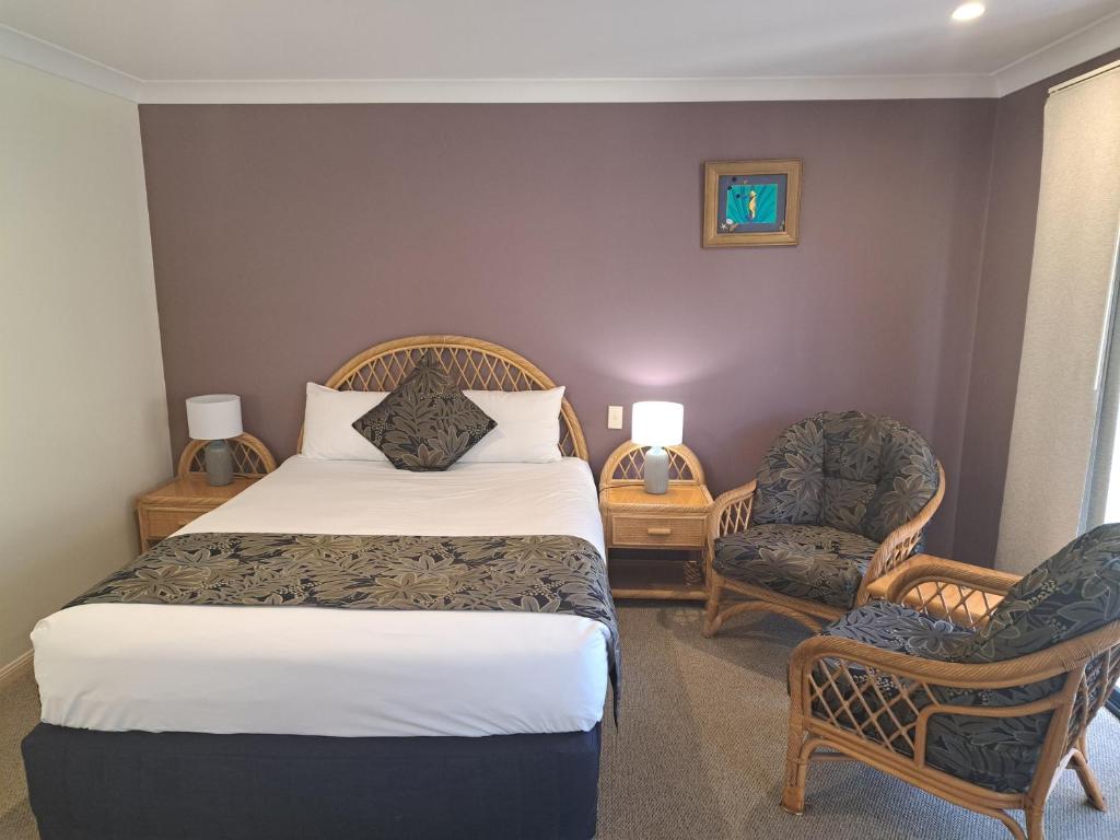 Postel nebo postele na pokoji v ubytování Sawtell Motor Inn