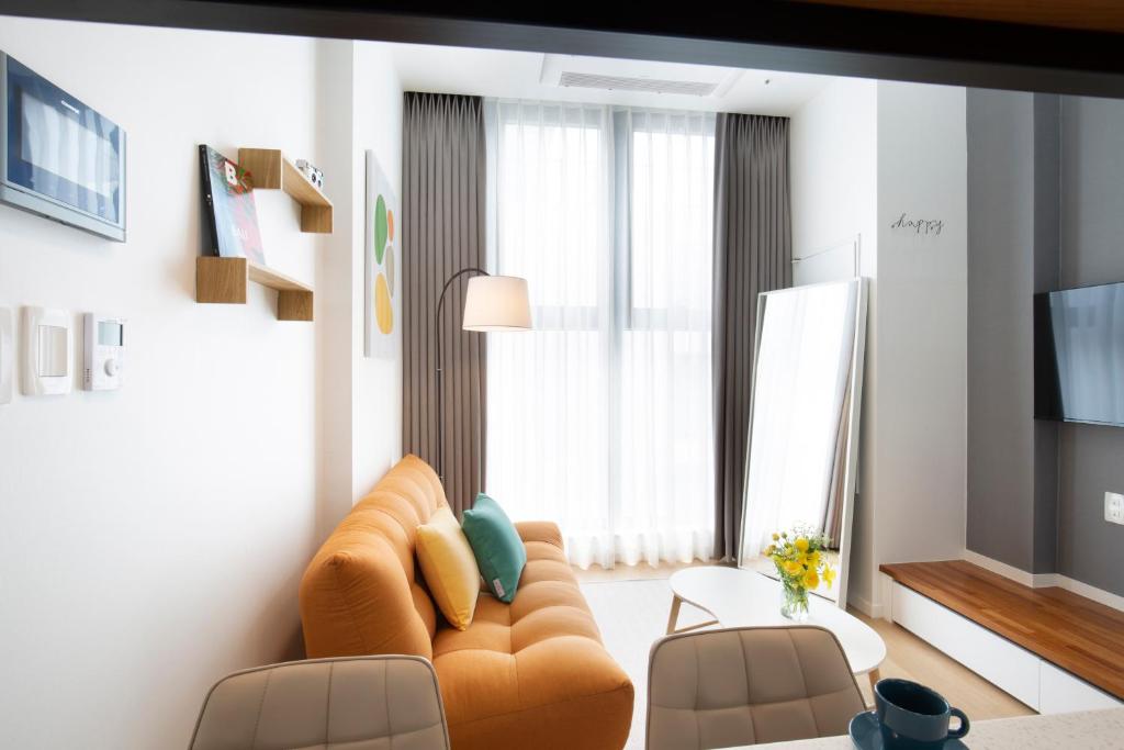 TV a/nebo společenská místnost v ubytování Busan Studio 202
