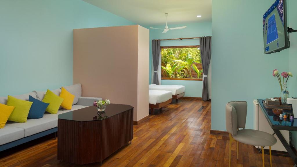 Postel nebo postele na pokoji v ubytování Sala Siem Reap Resort