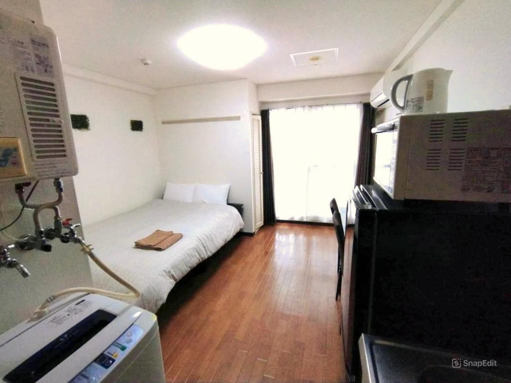 Postel nebo postele na pokoji v ubytování Presant South 8 West 1 / Vacation STAY 5823