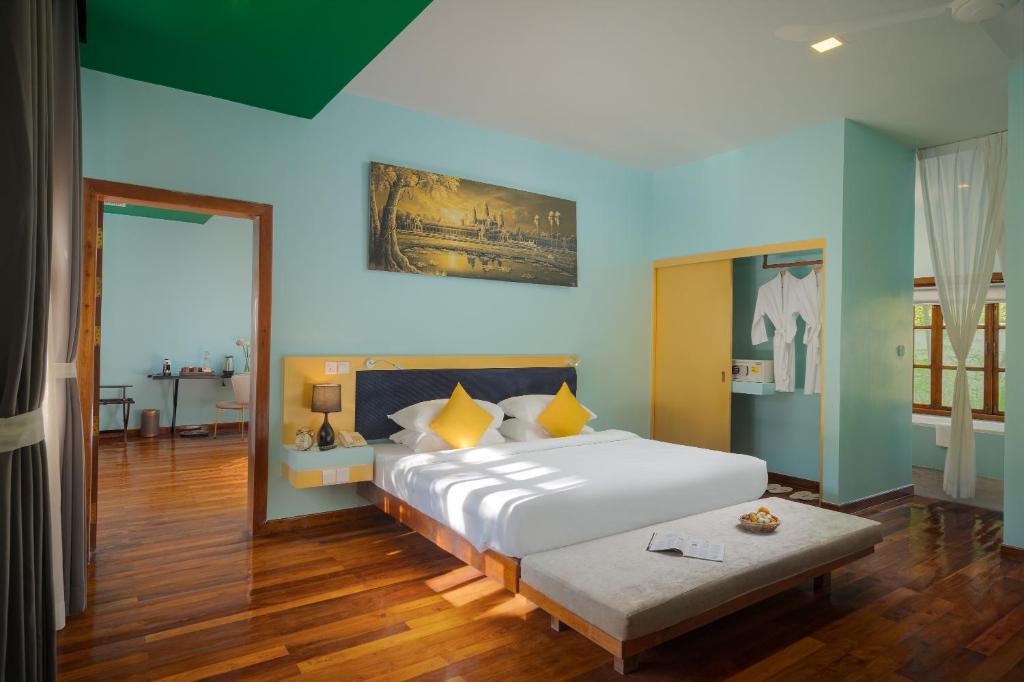 Postel nebo postele na pokoji v ubytování Sala Siem Reap Resort