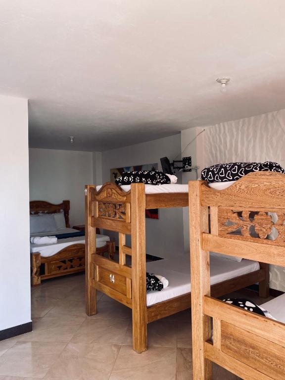 Llit o llits en una habitació de Hotel Estaciones