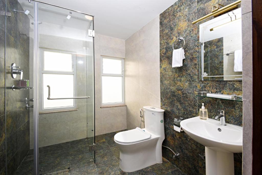 Koupelna v ubytování Hotel Sherpani