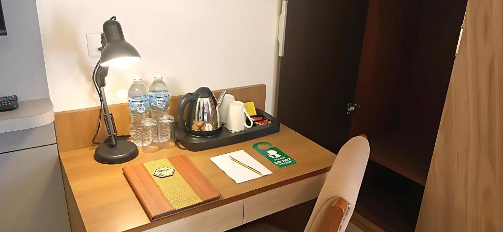 Příslušenství pro přípravu čaje a kávy v ubytování Hotel Sherpani