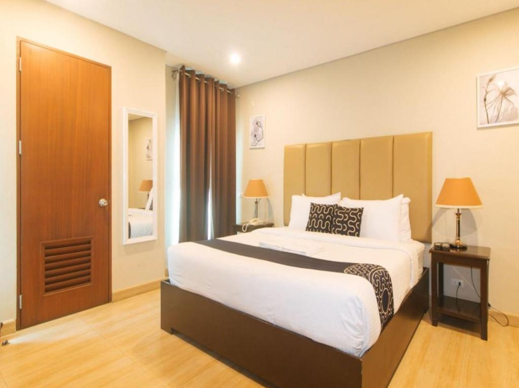 Postel nebo postele na pokoji v ubytování Asrodel Hotel RedPartner