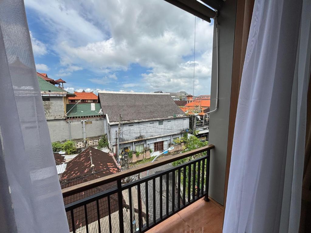 Balkón nebo terasa v ubytování Satriya Cottages