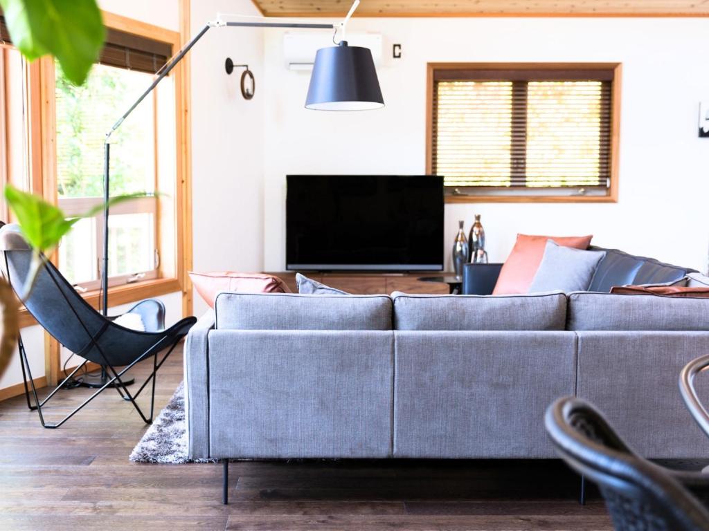 TV a/nebo společenská místnost v ubytování Monterey House by SANA