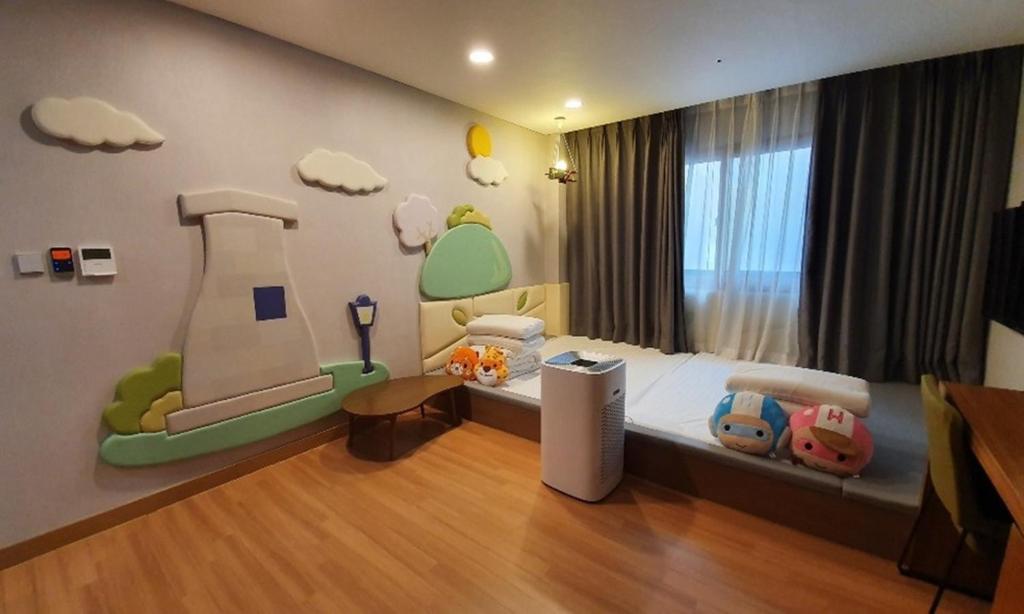 Postel nebo postele na pokoji v ubytování Silla Boutique Hotel Premium