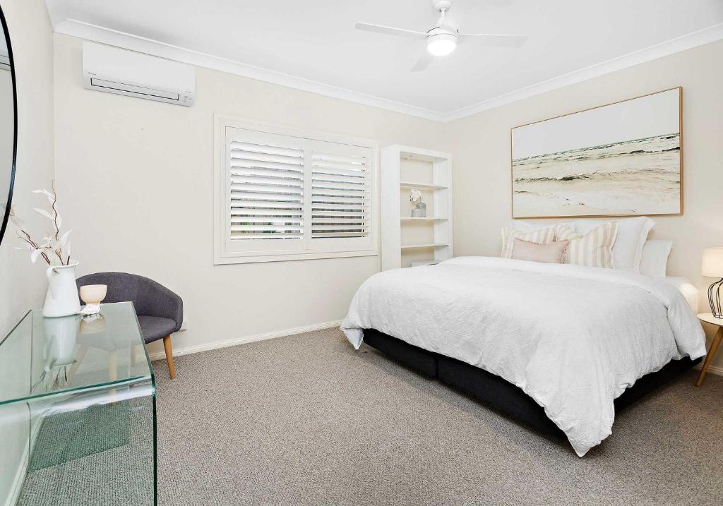 Postel nebo postele na pokoji v ubytování Shellharbour Poolside Escape