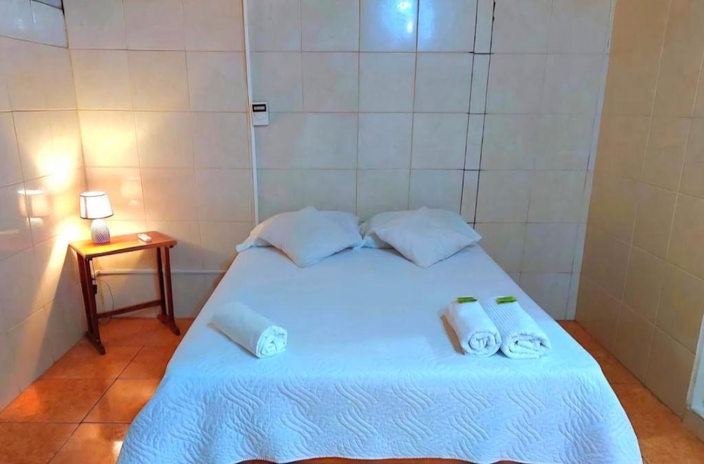 Postel nebo postele na pokoji v ubytování Hostel del Pacífico