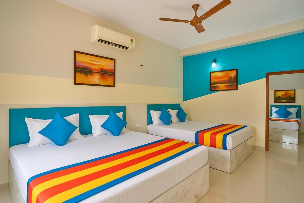 Postel nebo postele na pokoji v ubytování W2G Beach Front Stay