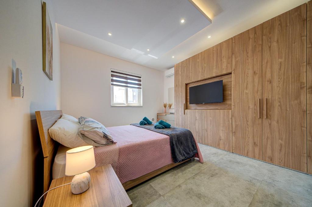 Voodi või voodid majutusasutuse Trident Cove Holiday Home toas