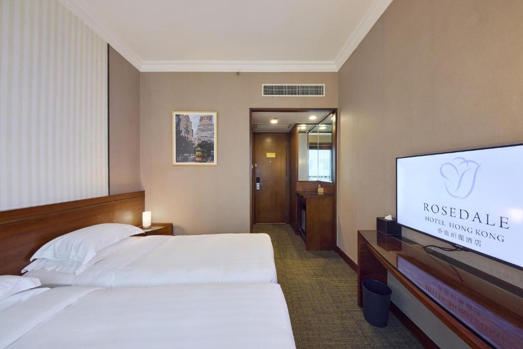 Voodi või voodid majutusasutuse Rosedale Hotel Hong Kong toas