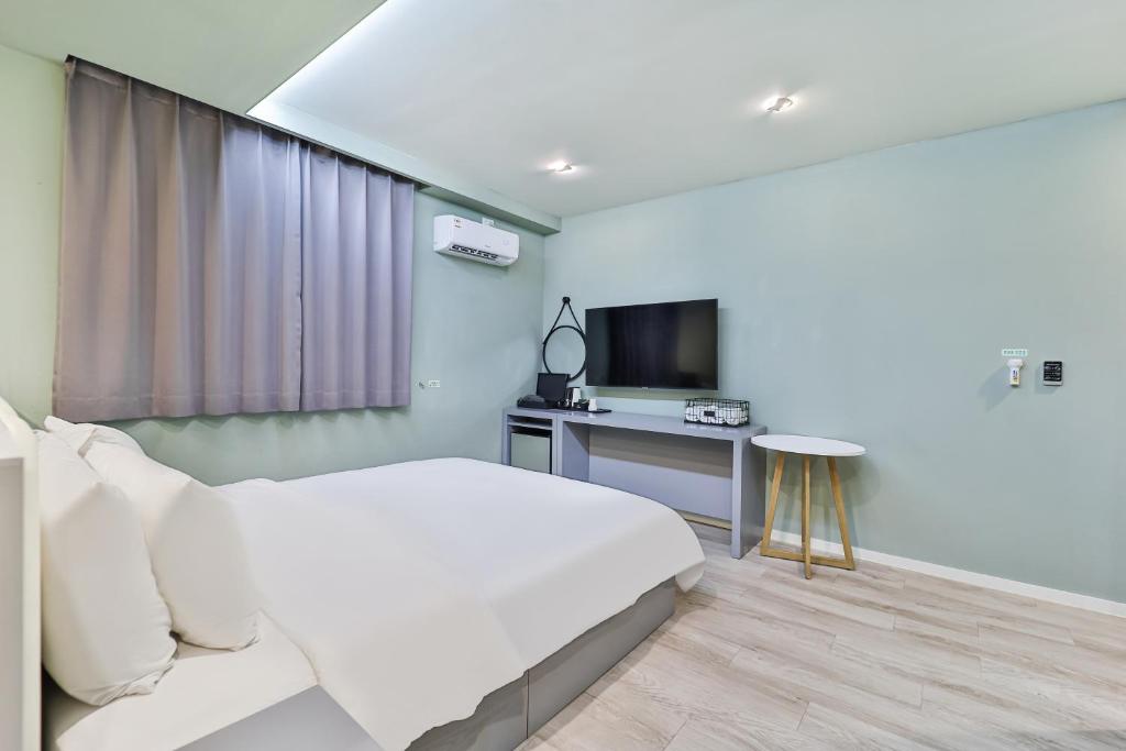 TV a/nebo společenská místnost v ubytování Sloth Hotel Busan Seomyeon
