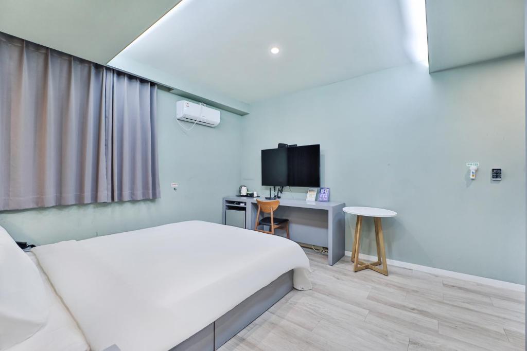 TV a/nebo společenská místnost v ubytování Sloth Hotel Busan Seomyeon