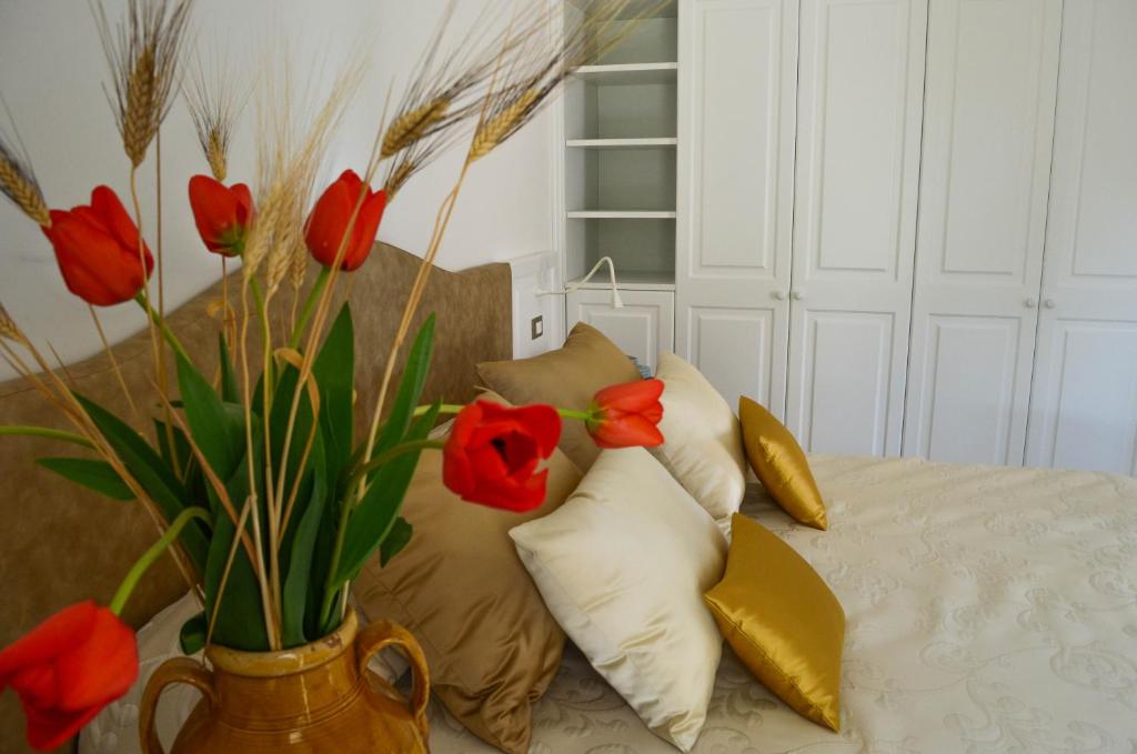 Postel nebo postele na pokoji v ubytování Hotel Masseria Tutosa
