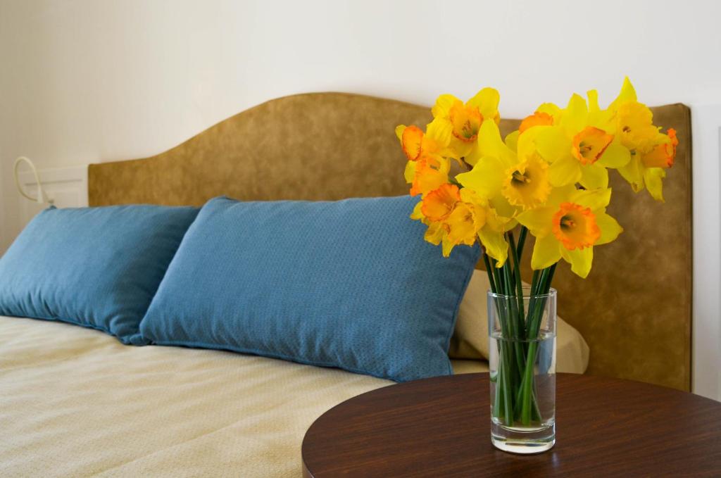 Postel nebo postele na pokoji v ubytování Hotel Masseria Tutosa