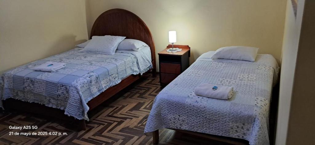 Postel nebo postele na pokoji v ubytování Lopez House