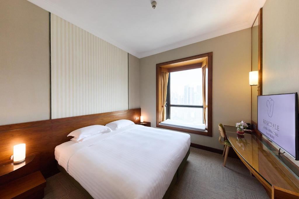 Voodi või voodid majutusasutuse Rosedale Hotel Hong Kong toas