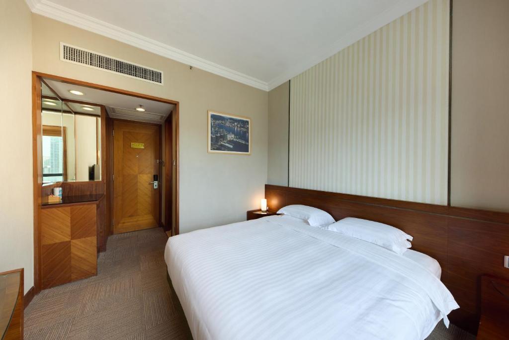 Voodi või voodid majutusasutuse Rosedale Hotel Hong Kong toas