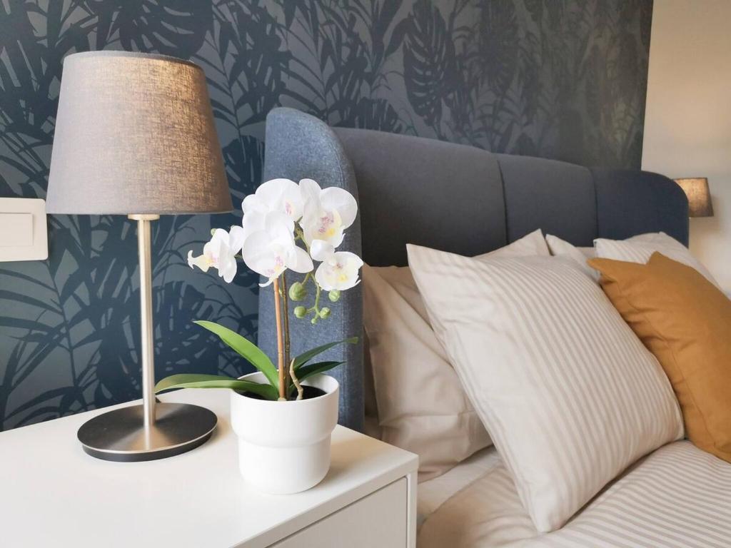 Łóżko lub łóżka w pokoju w obiekcie Apartament Tisalaya 44 By Pride Holiday Rentals