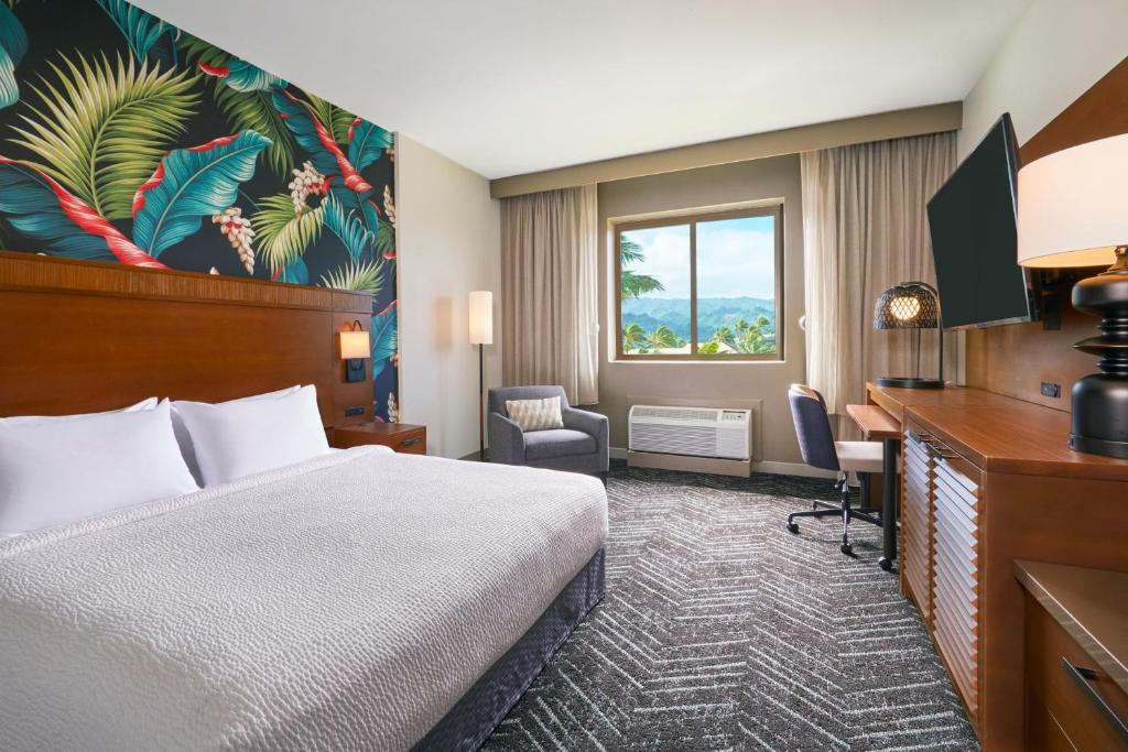 Cama ou camas em um quarto em Courtyard by Marriott Oahu North Shore