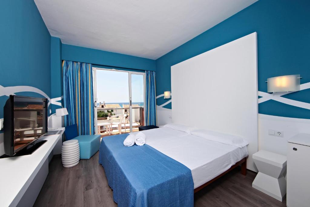 Postel nebo postele na pokoji v ubytování Hotel Clumba
