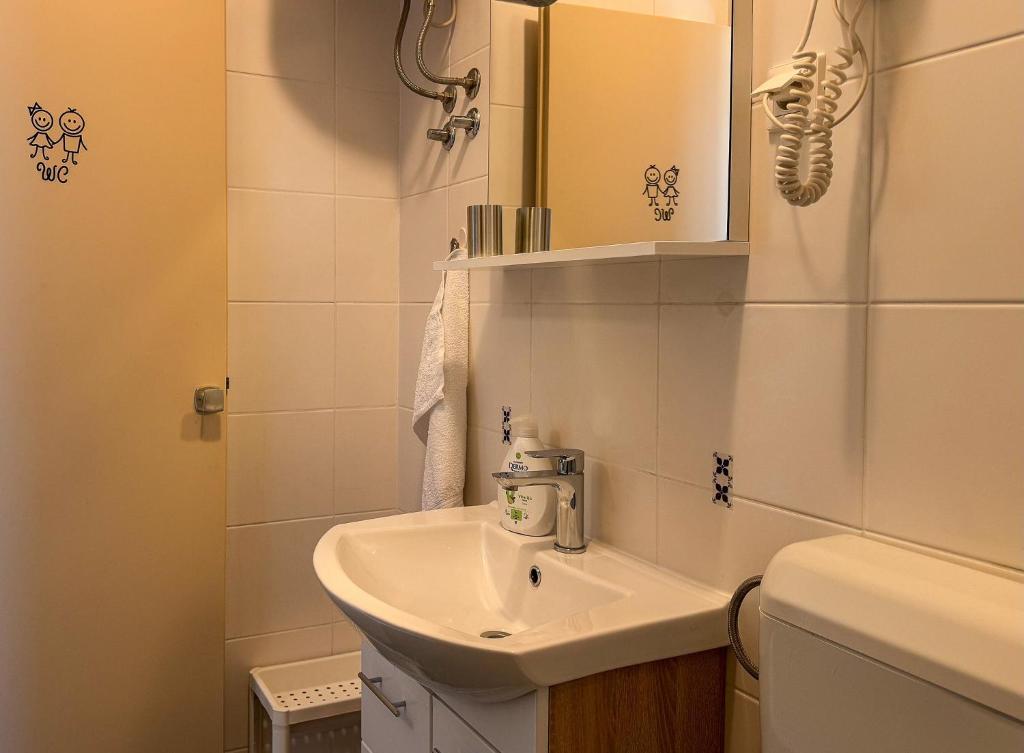 Koupelna v ubytování Apartments Pralas
