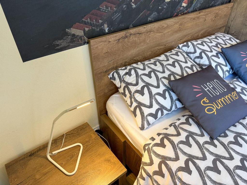 Postel nebo postele na pokoji v ubytování Apartments Pralas