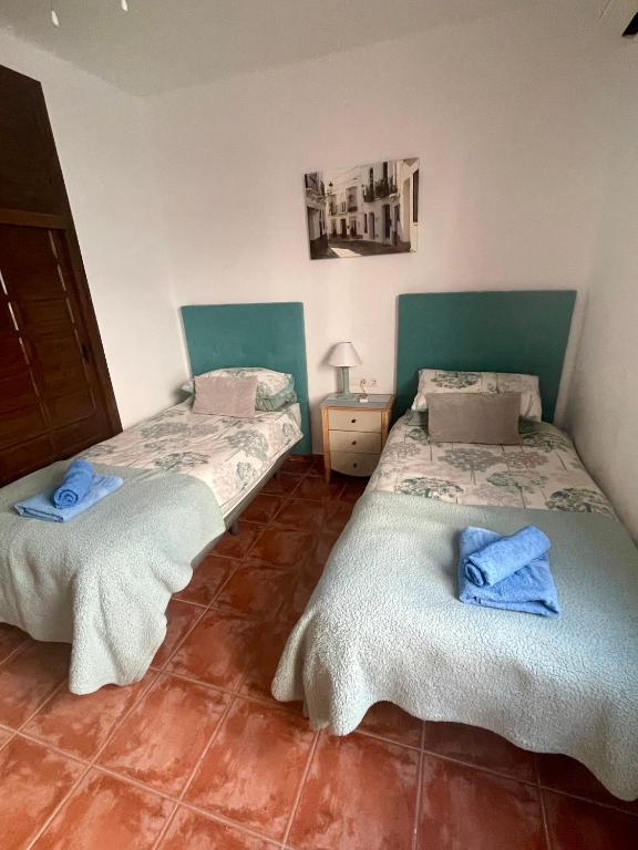 Postel nebo postele na pokoji v ubytování Casa Familiar in Punta Lara
