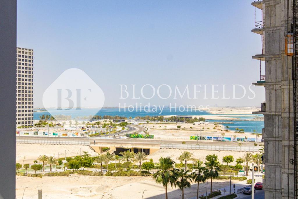 a view of the beach from a building at Bloomfields 1BR Elegant in Shams Meera in Abu Dhabi