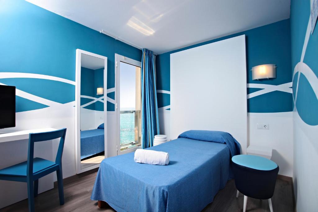 Postel nebo postele na pokoji v ubytování Hotel Clumba