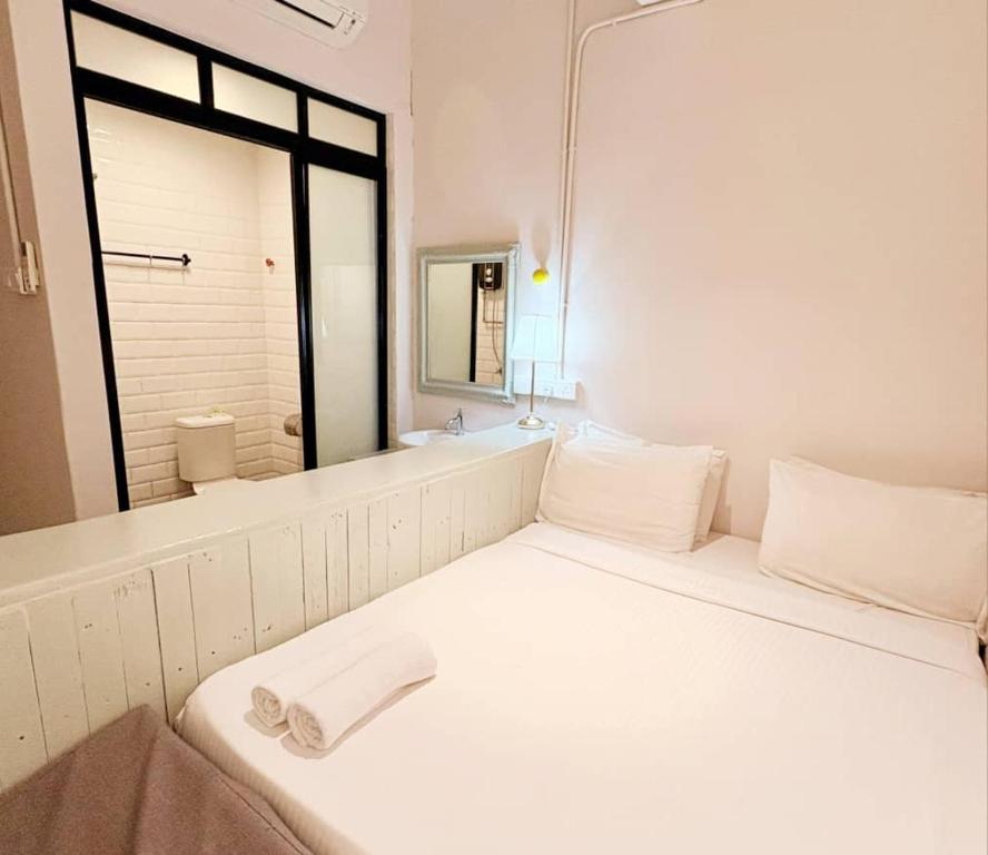 Postel nebo postele na pokoji v ubytování Kim Haus Loft